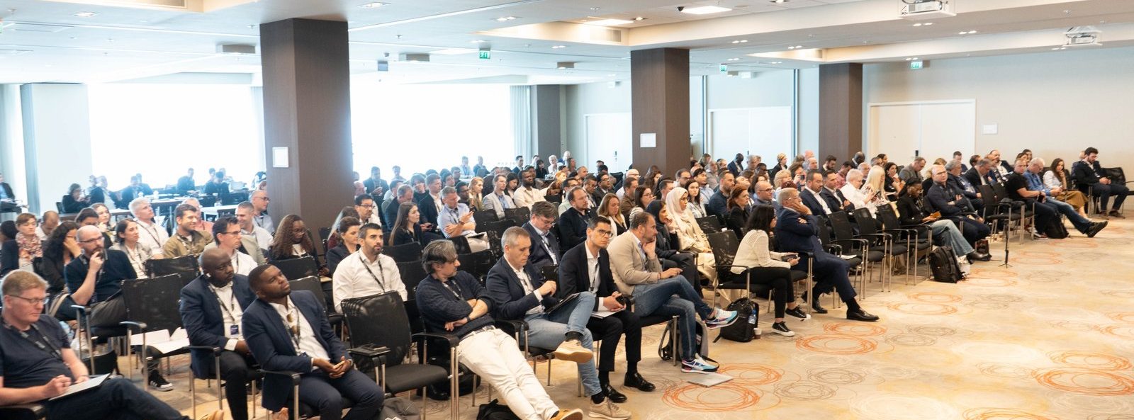 Delegates seated in the auditorium at a previous Excellence in Digital Banking summit in Amsterdam